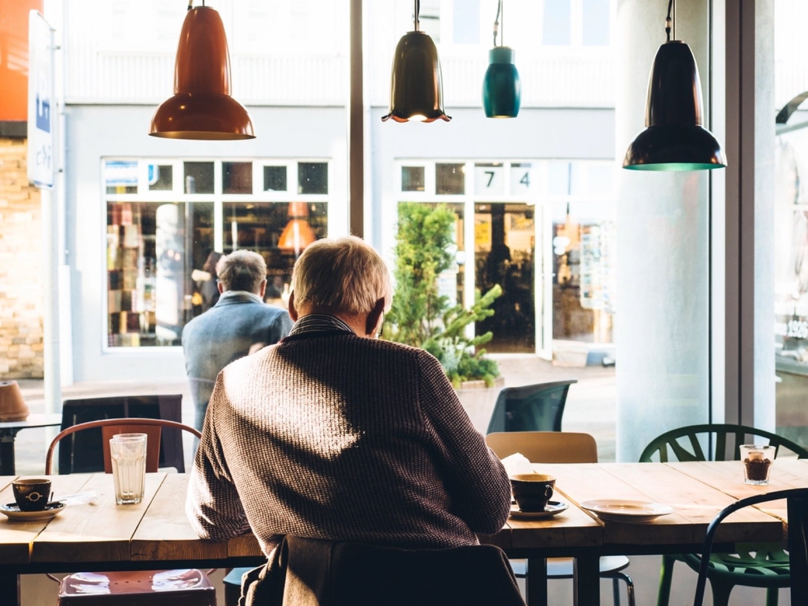 People sitting in a bright café