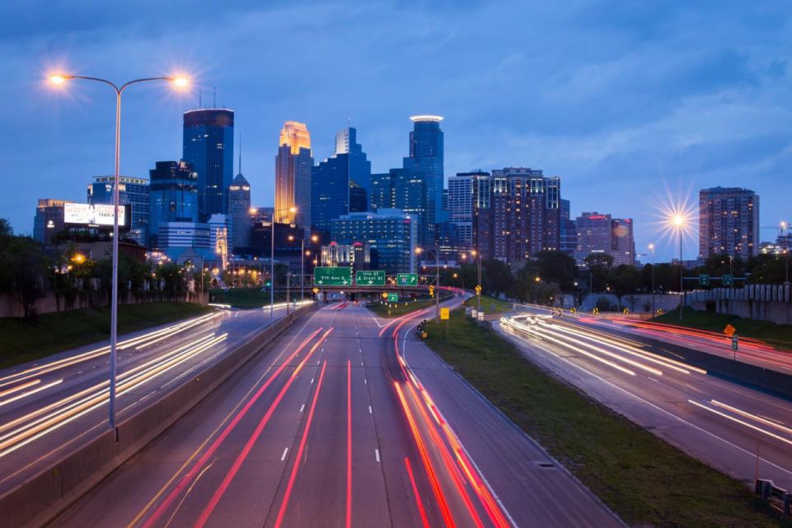 City traffic and towers at dusk