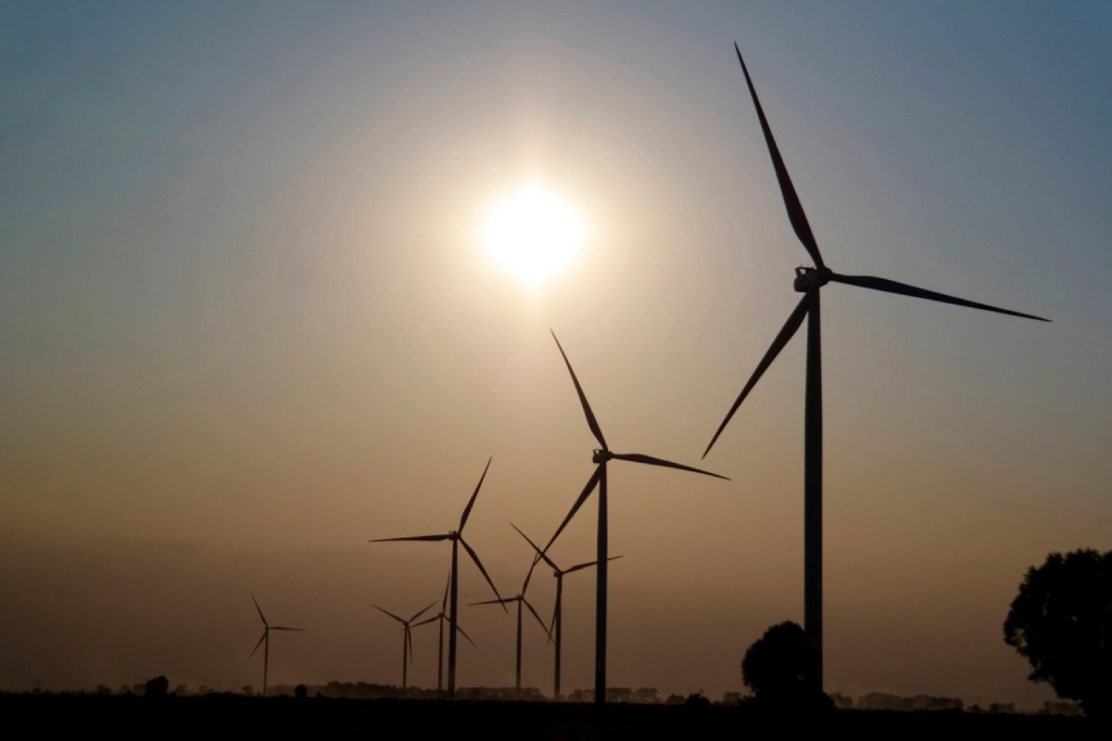 Wind turbines at sunset